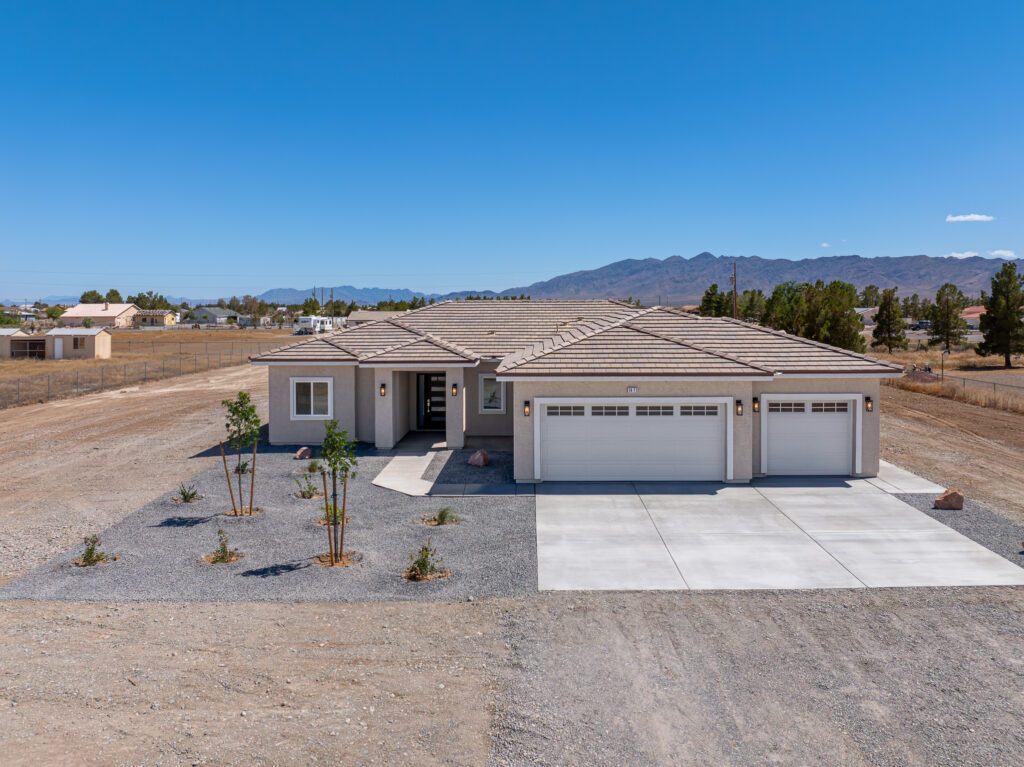 Aerial drone view of a custom home built by Innovative Custom Homes on a one-acre lot in Pahrump, Nevada, in Southern Nevada outside Las Vegas