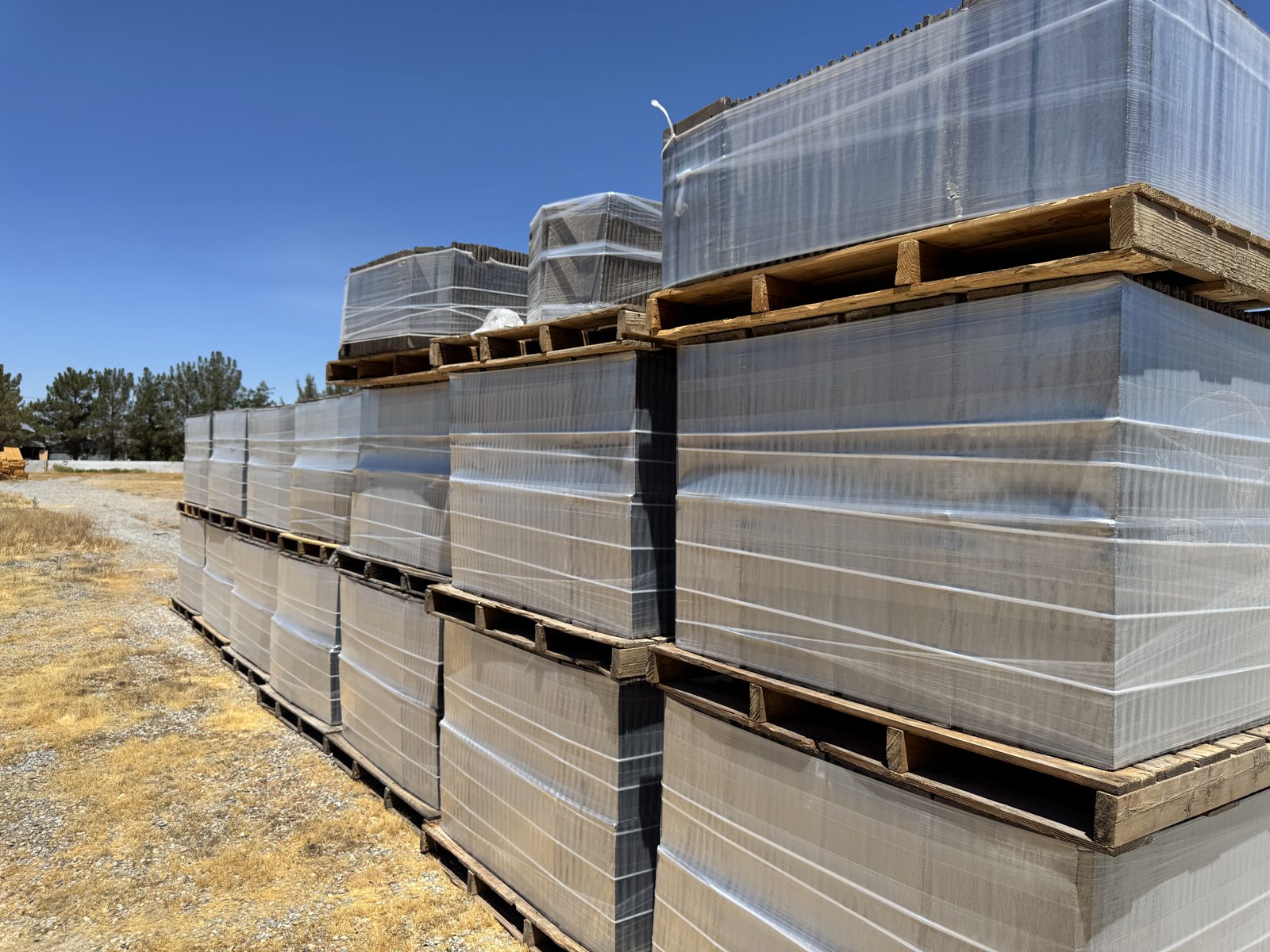 Eagle Roofing tile pallets staged on site at 3550 Margarita Ave, Pahrump NV